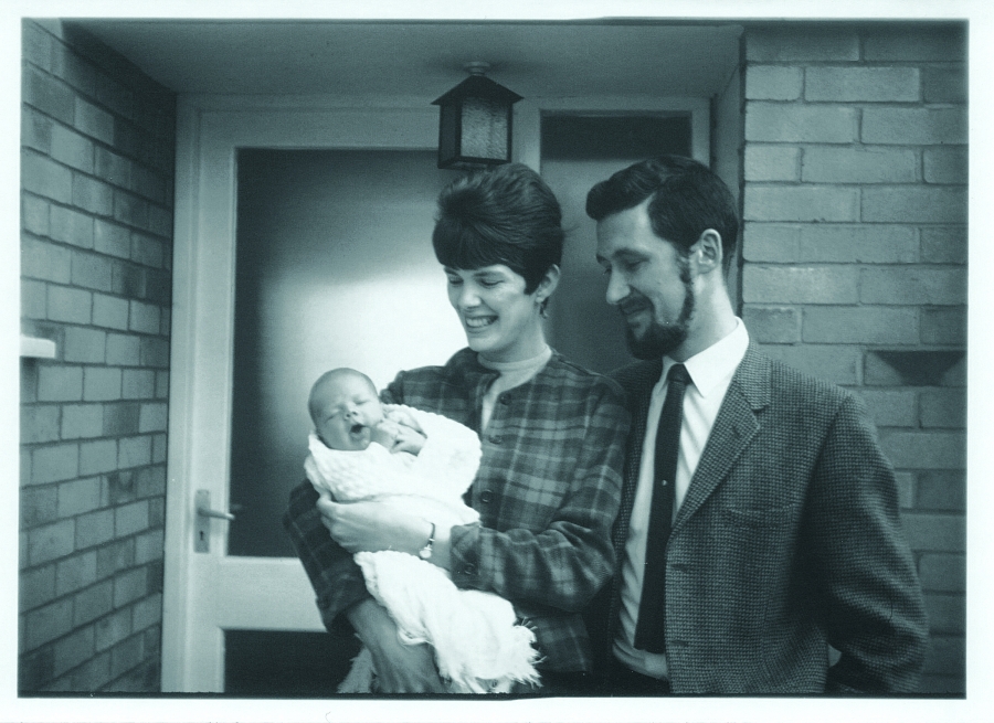 Vintage photo of Phyllis Foster Satter ’62 and Keith Johnson ’62 holding their baby